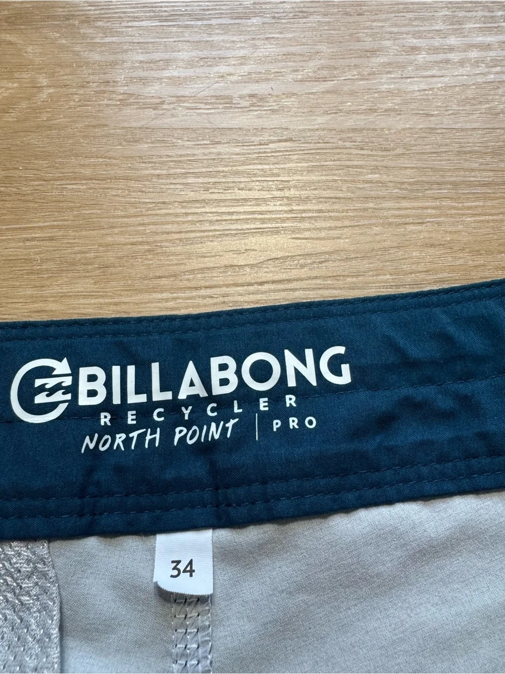 Billabong Navy and Teal Gradient Boardshorts with Red Trim